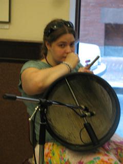 Casey takes a break in between songs to give her hand a rest from the bodhran